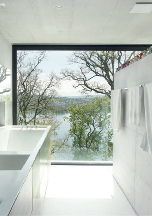 Minimalist bathroom with roof glazing skylight