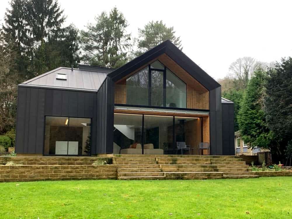 Modern house with aluminium sliding doors and large glazing